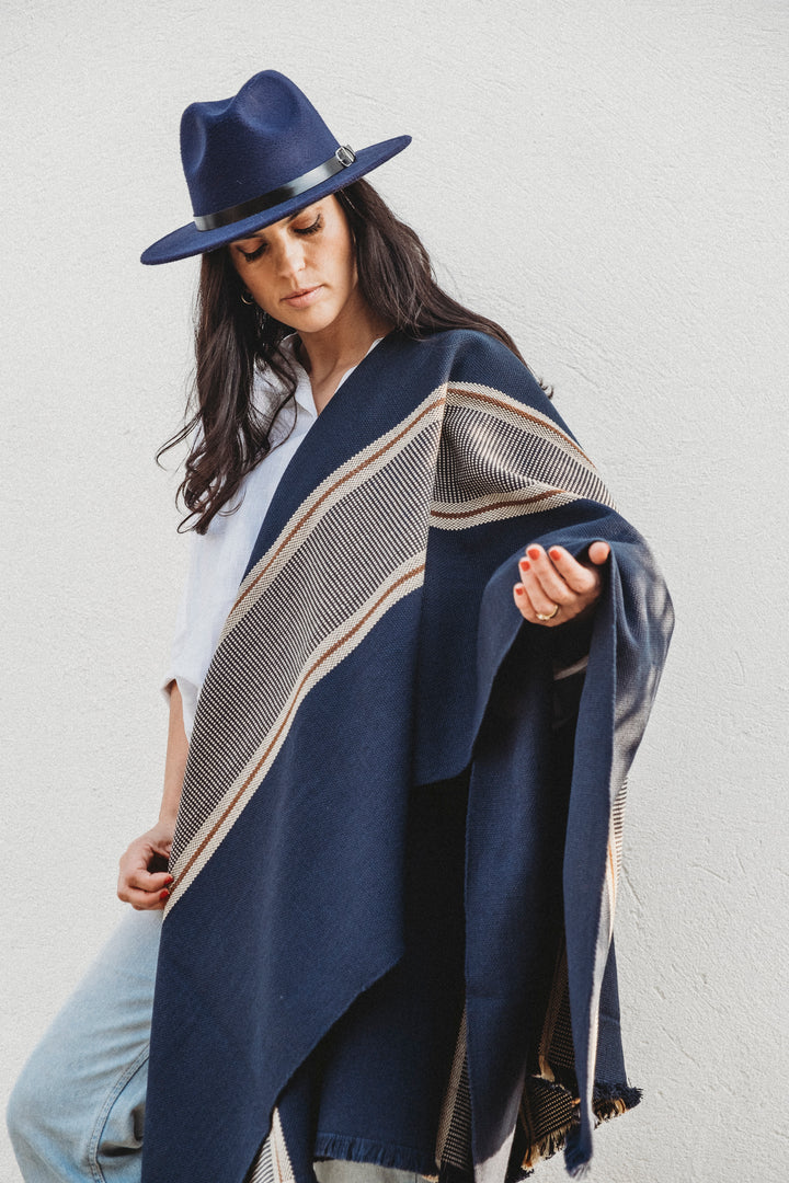 Blue poncho with two stripes