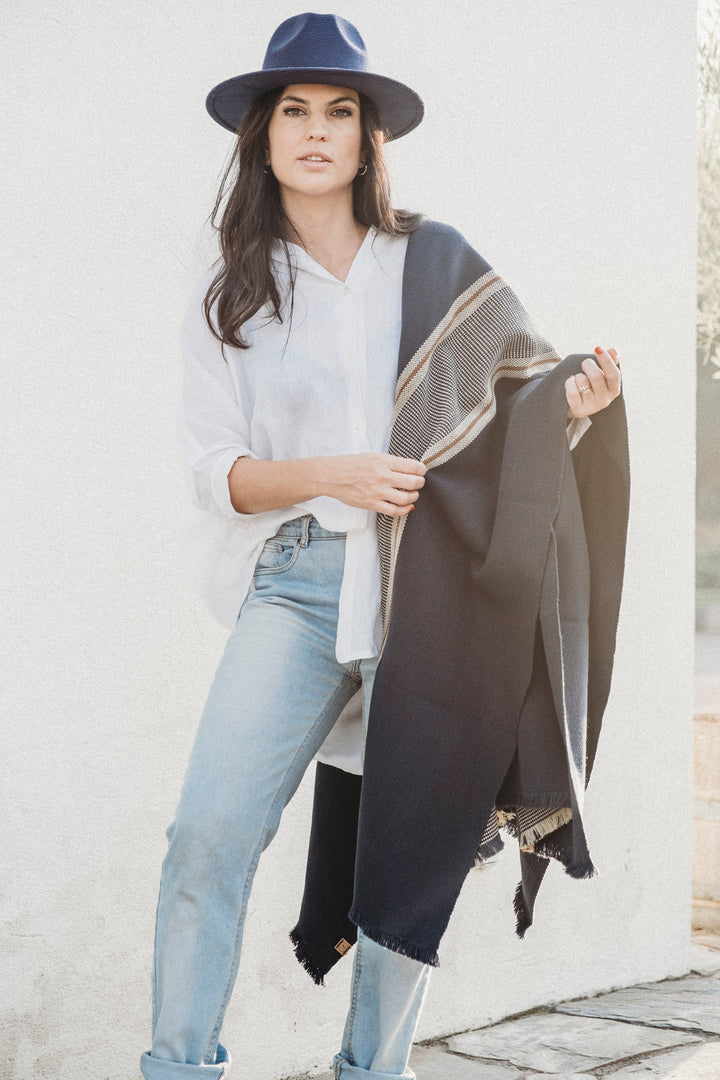 Blue poncho with two stripes