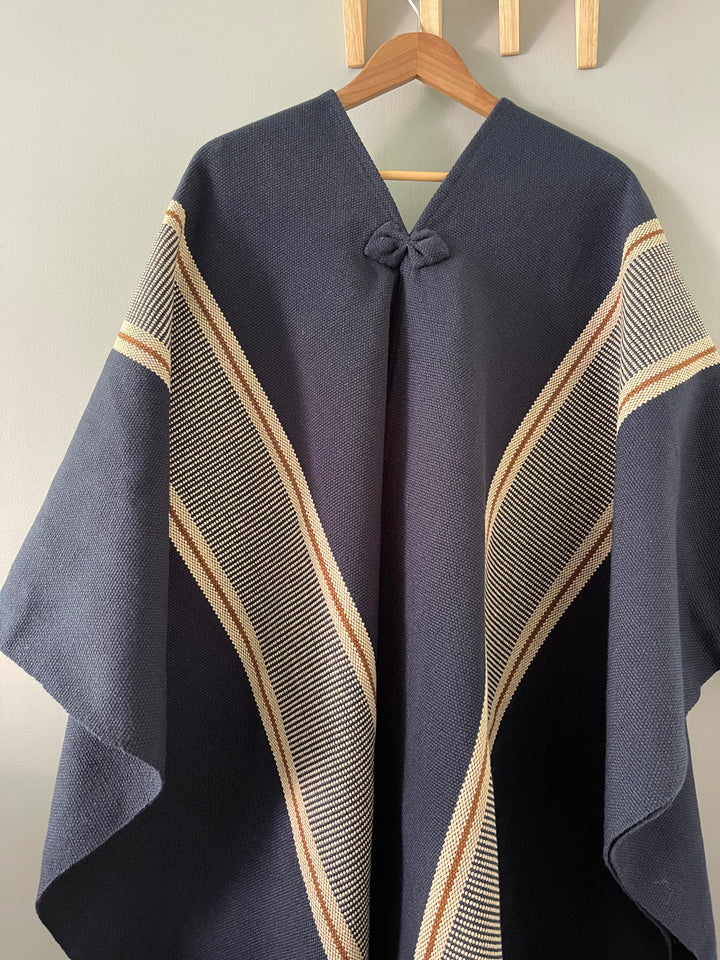 Blue poncho with two stripes
