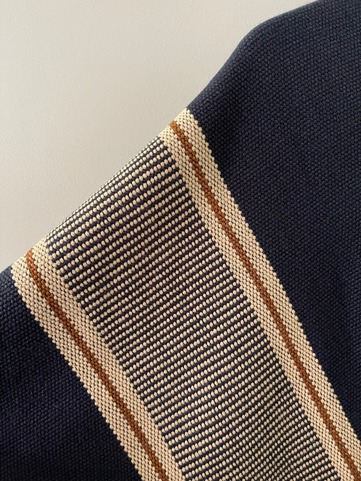 Blue poncho with two stripes