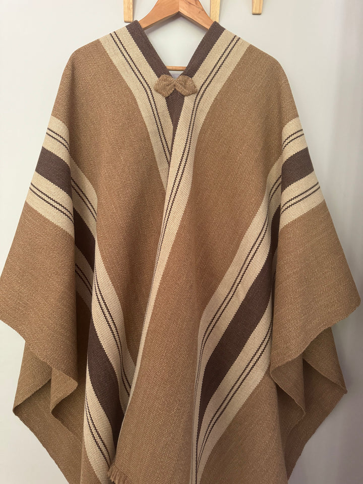 Light brown poncho with three stripes