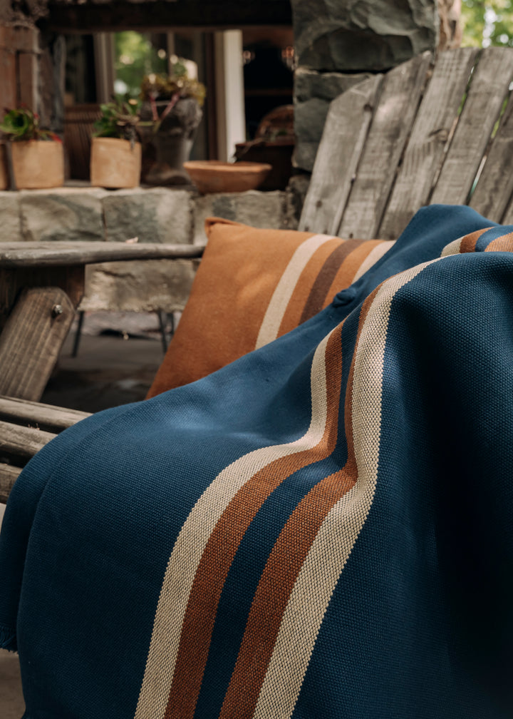 Blue poncho with two stripes