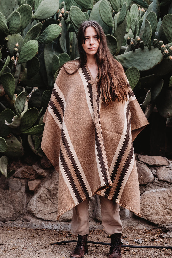 Light brown poncho with three stripes
