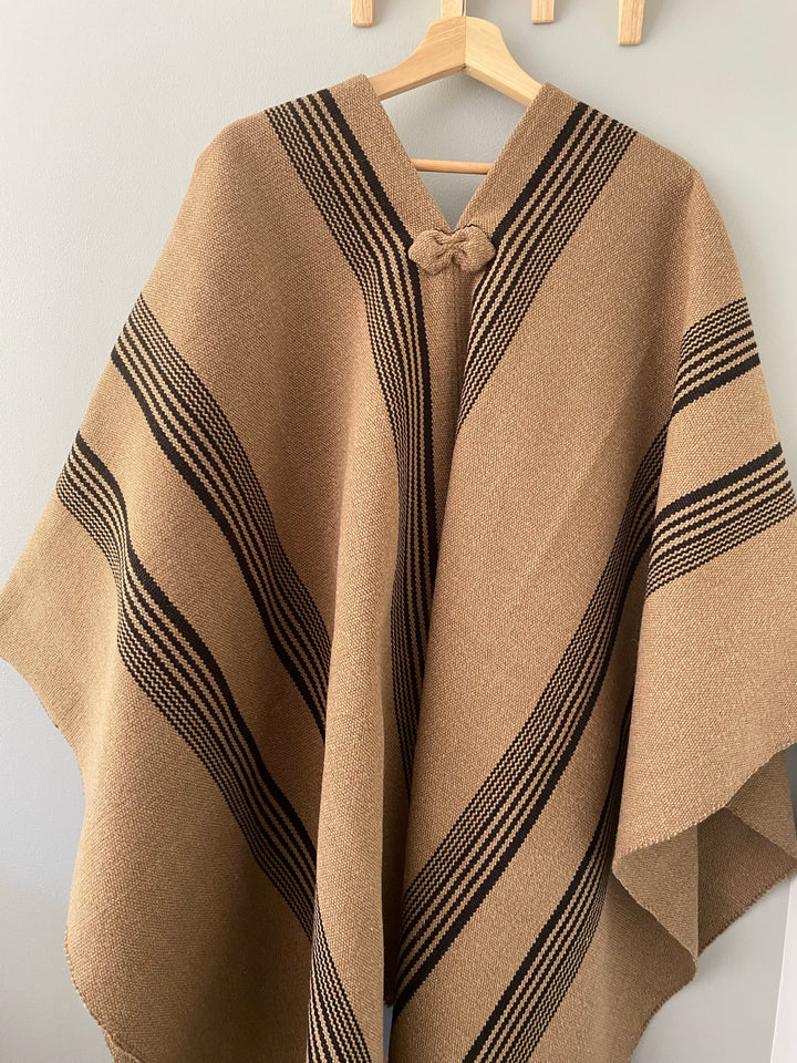 Light brown poncho with three stripes