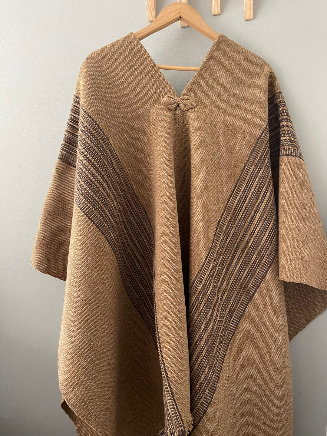 Brown poncho with two stripes